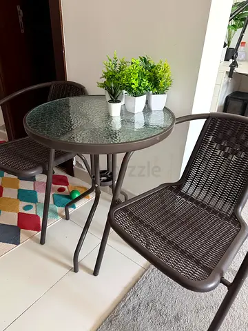 outdoor table with 2 chairs