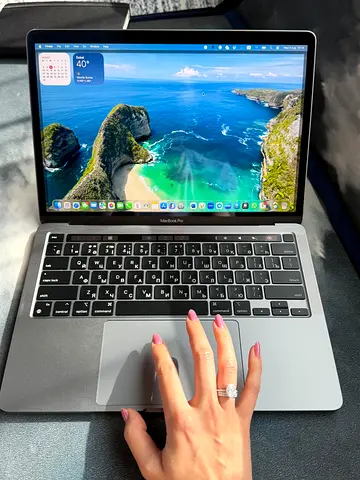 MacBook Pro — used, good condition (back shown).