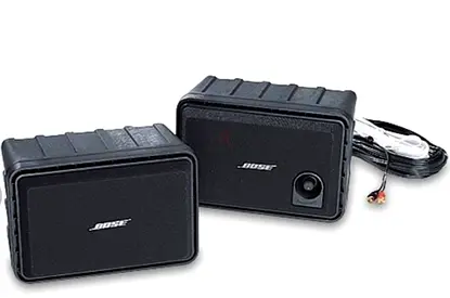 Pair of Bose small powered speakers (black)with built in amplifier - good condition