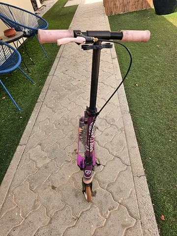 Child's Purple Kick Scooter with Hand Brake and Pink Grips