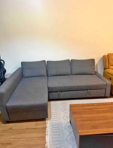 ikea L shape sofa cum bed with big storage and you can fix the storage left or right any side