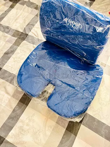 Blue ergonomic seat cushion with lumbar support (new, wrapped)