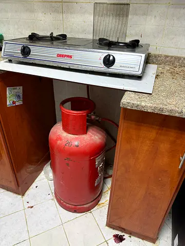 2 burner auto ignition gas stove and glass cylinder with half gas