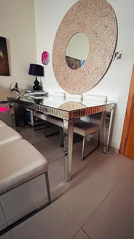 Glass-top mirrored dining table with chrome legs - good condition