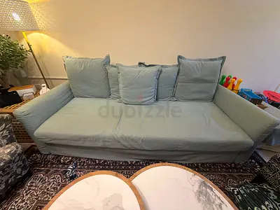 Ikea 3-seater slipcovered sofa with cushions and it comes with 2 extra covers!