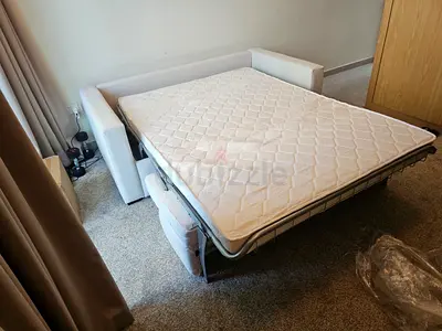 Italian comodo two seater sofa bed with mattress