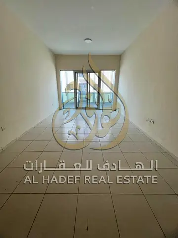 Apartment near Al-Jubail bus station: two rooms and a living room with a balcony; features central air conditioning and central gas.