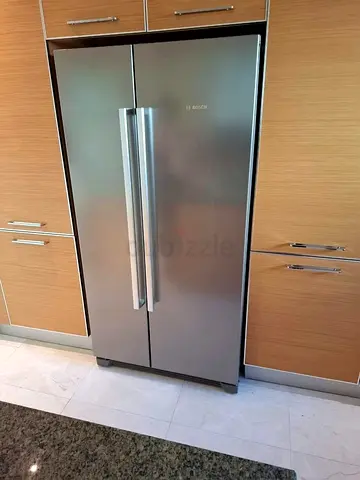 Bosch Side-by-Side Refrigerator - Good Condition, Spacious Interior