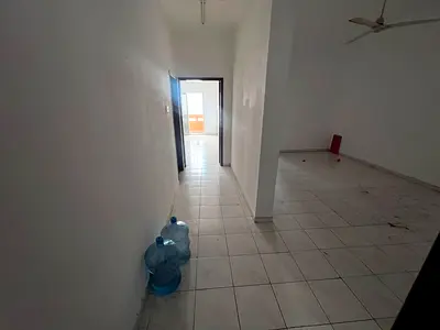 **Annual Rent - 2 Bedrooms and Living Room | Second Row from Ajman Corniche** A distinctive apartment in a prime location on the **second row from Aj