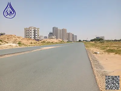 ارض تجاري G+15مع رخصة البناء علي شارع الشيخ محمد بن زايد بمنطقة العالية