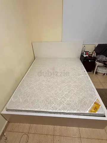 White platform double bed frame of size 200*160 cm, with medical mattress - good condition
