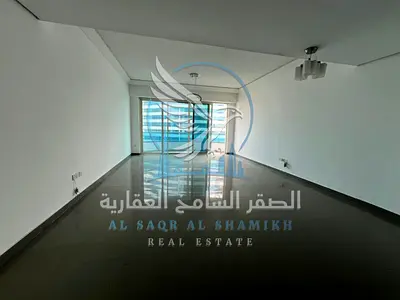 **Two-bedroom apartment for rent in Al Majaz 3 | Master bedrooms | Sea view | Built-in wardrobes | Free parking**
