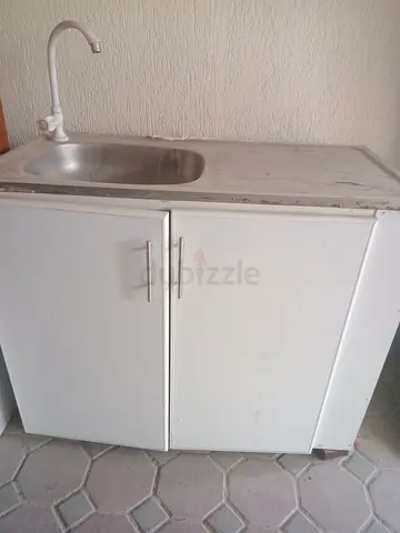 Used single-bowl kitchen sink unit with cabinet and drainer ,tap also