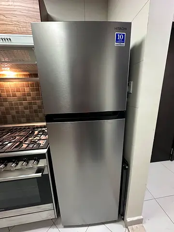 Stainless steel bottom-freezer refrigerator - good condition