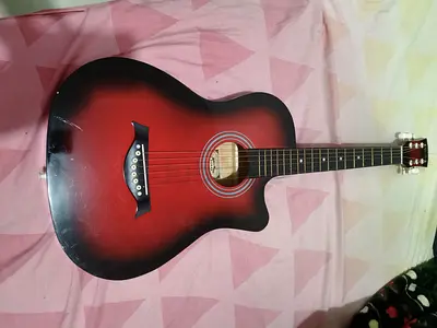 Red sunburst acoustic guitar - used, playable condition