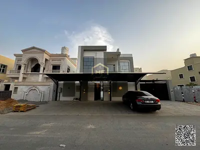 فيلا فاخرة بتصميم عصري ومساحات واسعة للبيع في منطقة العامرة، عجمان. الفيلا جاهزة وموصلة بالكامل بجميع الخدمات (كهرباء وماء) للتملك الفوري!  تفاصيل الع