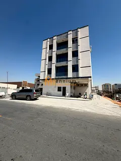 New G+3 building for sale in Tilal City; prime location and freehold ownership available for all nat