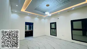 Modern villa for sale in the Al Yasmeen area, Ajman; includes electricity and water connections.