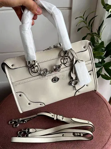 Cream leather top-handle bag with detachable strap