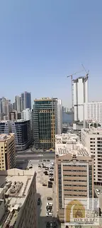 Luxurious two-bedroom master apartment with a living room for annual rent in Al Khan, boasting a stu