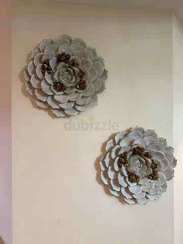Pair of ceramic decorative wall flower sculptures - white & gold