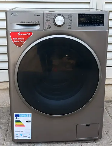 This front load LG 8.5kg direct drive washing machine, condition is perfectly working, grey color.