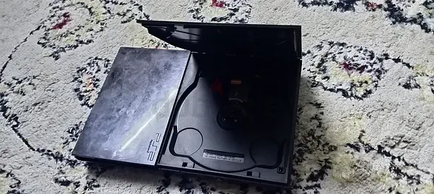 Sony PlayStation 2 Slim modded console - working condition, with lid shown