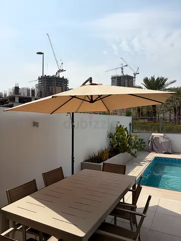 Outdoor large beige cantilever umbrella