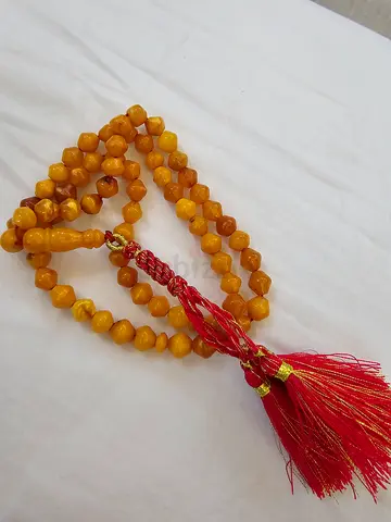 Amber-colored Tasbih Prayer Beads with Red Tassel - 33 Beads