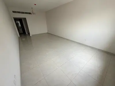 2BR on Ajman Corniche, 2 master bedrooms, 3 bathrooms, sea-view balcony, spacious layout, central AC, free parking, owner maintenance