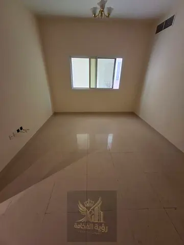 For rent in Al Khan Sharjah two bedroom apartment with living room two bathrooms central AC annual rent AED 38000 payment in 4 or 6 installments depos