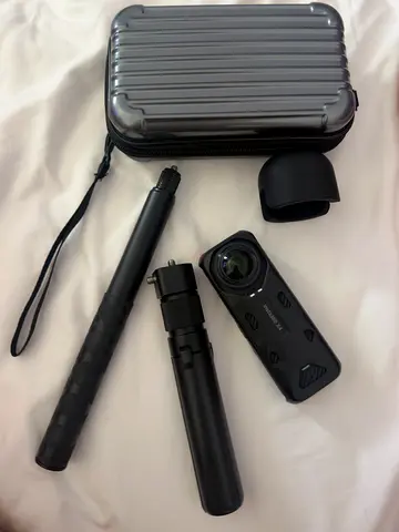 Insta 360 x4 camera kit with case, mini tripod and handheld pole