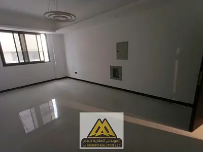 For rent in Al Jurf 3, Ajman: 1BR, balcony, central AC, free maintenance, AED 33K, 4 payments.