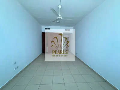 Spacious 2BR with sea view in Ajman One Towers, Al Rashidiya 3, 2 master bedrooms, 3 bathrooms, balcony, open kitchen, parking, near the Corniche.
