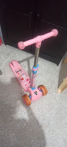 Pink 3-wheel kids scooter - adjustable handle, good condition