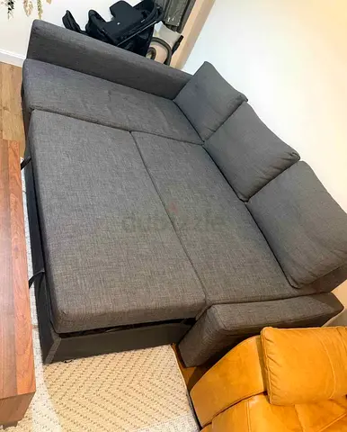 ikea L shape sofa cum bed with big storage and you can fix the storage left or right any side you