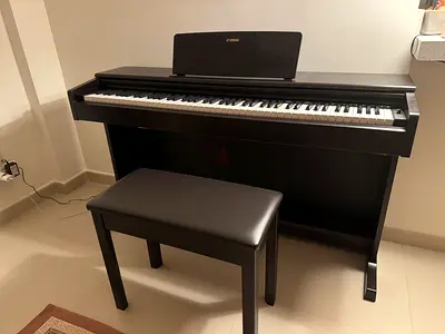 Yamaha YDP 145 digital piano with bench - excellent working condition