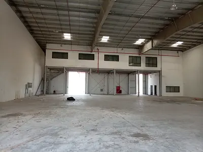 12,300 sqft Warehouse | 10,500 Ground + 1,800 Mezzanine | 70 kW Power | Offices + Bathrooms + Kitchen | Umm Al Thaoub, Umm Al Quwain | AED 450,000 Yea