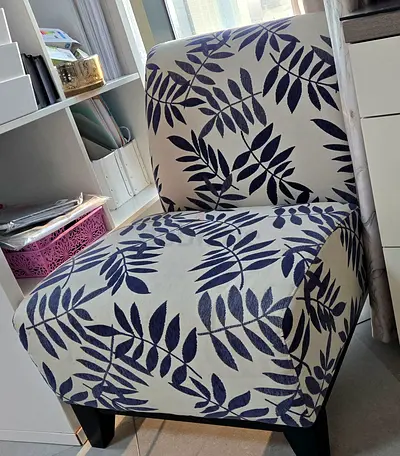 2QTY of Compact accent chair with navy leaf print upholstery