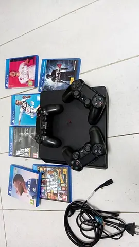 PS4 Slim Console - 3 Controllers + 6 Games (GTA V, Uncharted 4, TLOU & FIFA) - Great Condition!