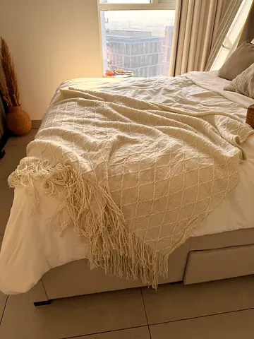 Cream bed throw