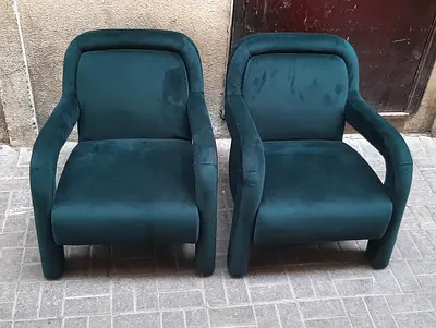 Pair of dark green velvet armchairs