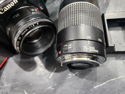 Canon eos camera 1100d and Projector