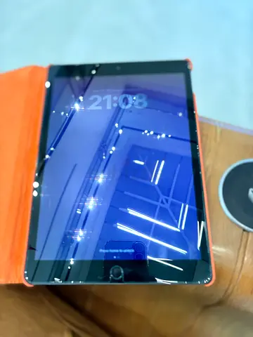 Apple iPad in Grey with Orange Flip Case