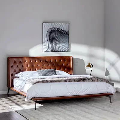 Upholstered brown faux leather Bed.