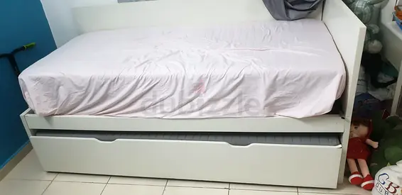 Urgent! 2 mattress FREE with White wooden single bed with trundle with wheels
