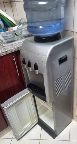 Standing water dispenser with bottom storage fridge - silver, working condition Brand:Hitachi