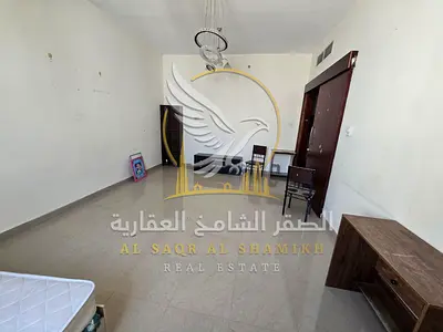 One bedroom and living room in Al Qulaya Sharjah balcony open view built in wardrobes master bedroom laundry room free private parking