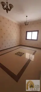 Two-bedroom apartment for annual rent in Al Khan, Sharjah | Open sea view | Balcony | Built-in wardr