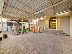 Sea view near beach 4 bedroom like new villa central ac 2 hall Majlis balcony wardrobes parking 120k